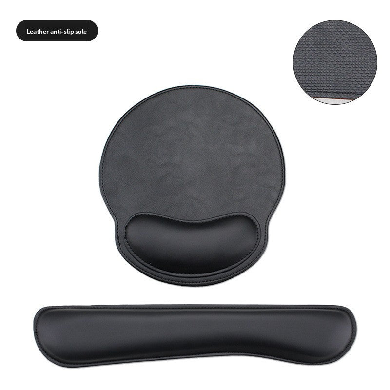 Close view of stitched edges on a leather look memory foam wrist rest