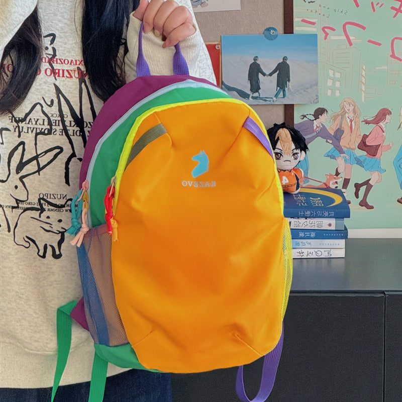 Yellow color block nylon backpack held up, double zip main compartment and two mesh side pockets