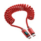 Red spring coiled USB-C charging cable with a USB-C plug at both ends
