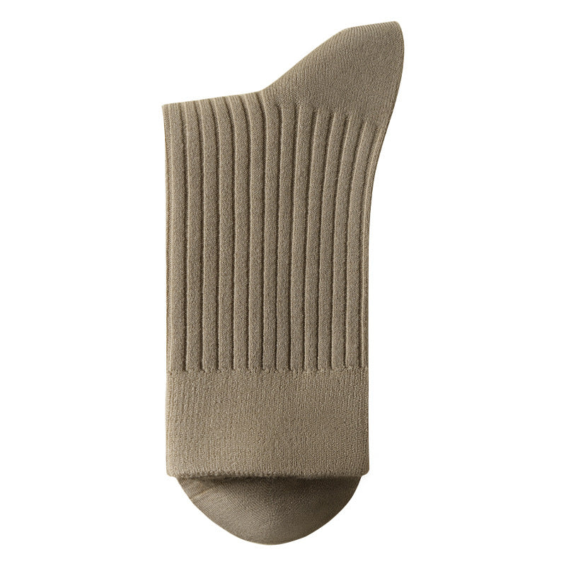 Solid color wool blend mid calf socks with stretch cuff, studio photo on a plain background