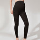 Black maternity leggings with a tall stretch belly panel shown on a model front view