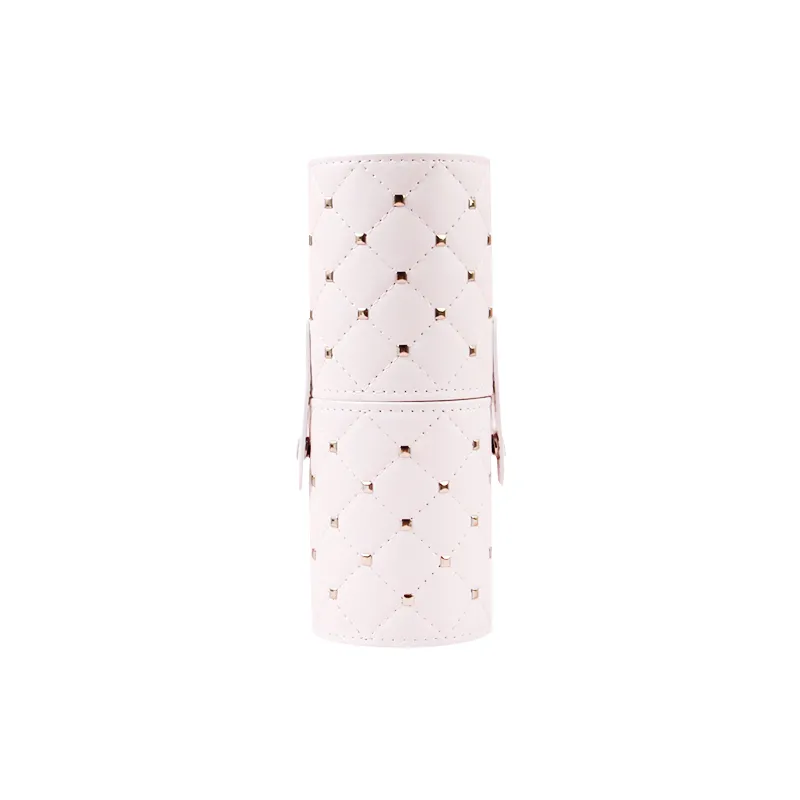 White PU leather makeup brush holder with gold pyramid studs and quilted diamond pattern, lid closed