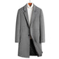 Gray single-breasted long coat with notch lapel and two buttons over a white turtleneck, size 190/3X option