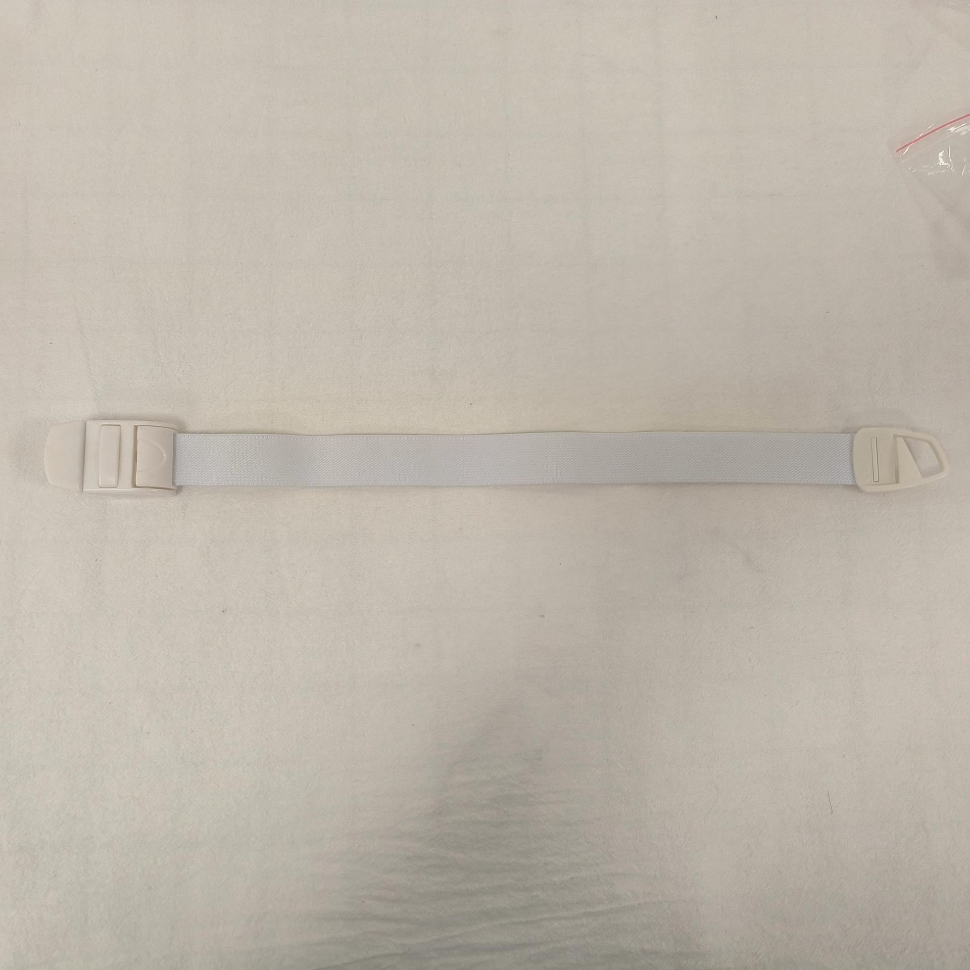 Single white elastic quick release tourniquet band with a white snap buckle laid flat