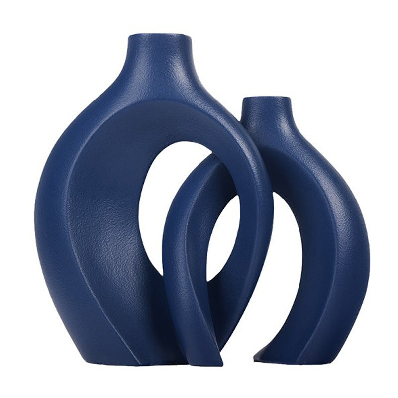 Nordic ceramic nesting vase set shown from the side, minimalist curved shape