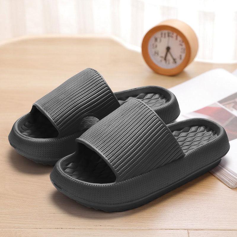 Hand pressing into the footbed to show memory foam give