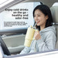 Woman drinking through a titanium straw from a yellow handled tumbler while seated in a car