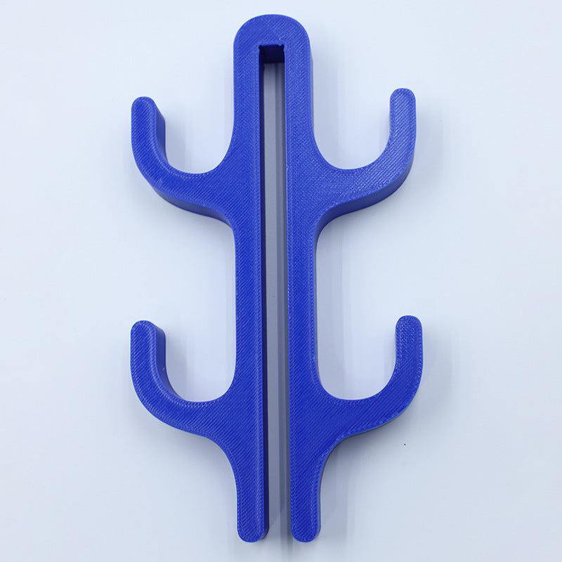 Blue resin four hook with four arms, seen from the front on a light background