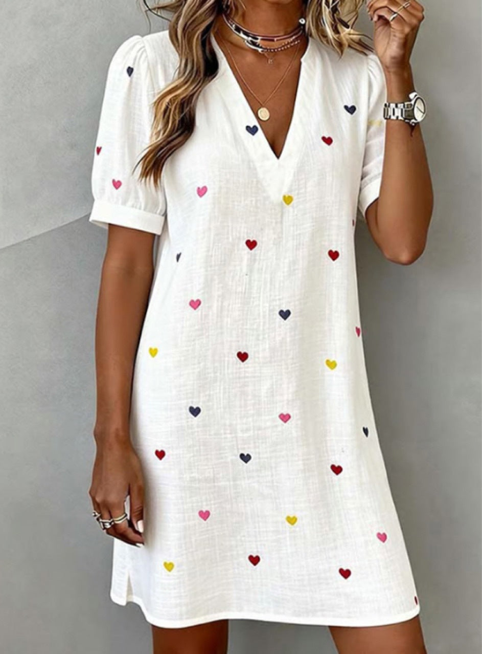 Printed dress shown folded to present the colour and print detail