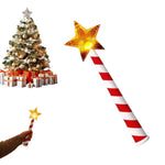 Light up star Christmas wand with red and white candy cane handle and glowing gold star, with tree