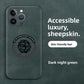 Dark night green sheepskin leather dragon phone case showing the central magnetic ring and totem