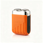 Orange mini rotary electric shaver with two chrome floating heads and a black side button on a white background
