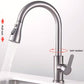 Brushed faucet running, arrows marking the pull out travel of the head and the 360 degree rotation