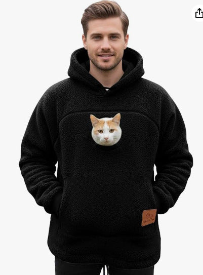 Black sherpa fleece pet pouch hoodie on a man with a cat riding in the chest pouch