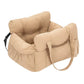 Padded car seat pet bed with raised bolster walls, carry handles and an inner clip the larger size shown on a bench seat
