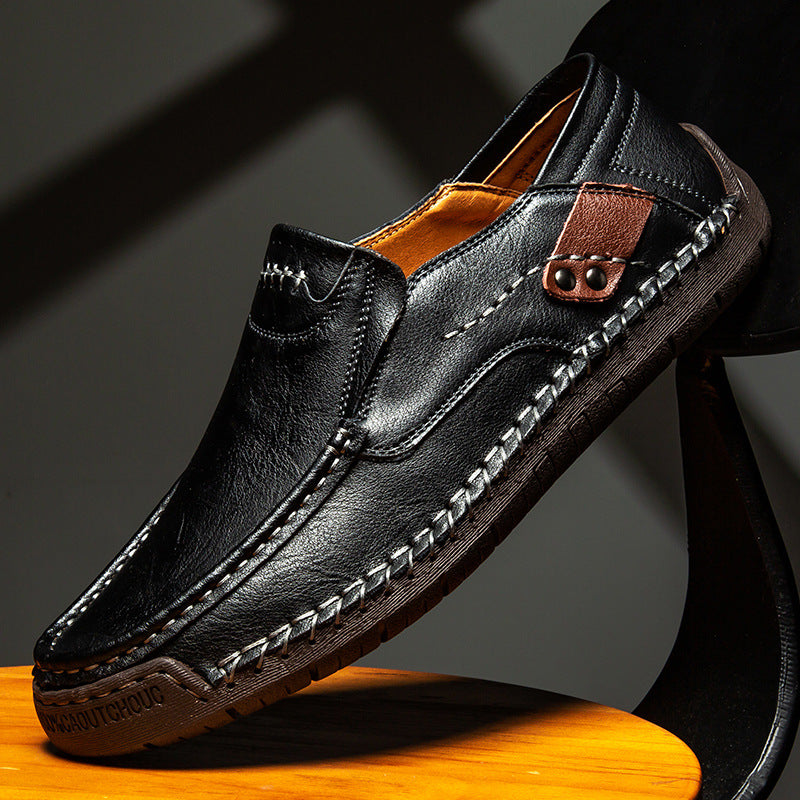 Close view of the hand stitched moccasin seam on a cowhide leather loafer