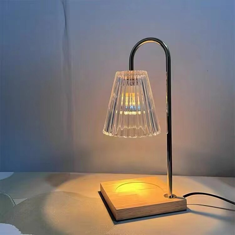 Candle warmer lamp lit low as a night glow