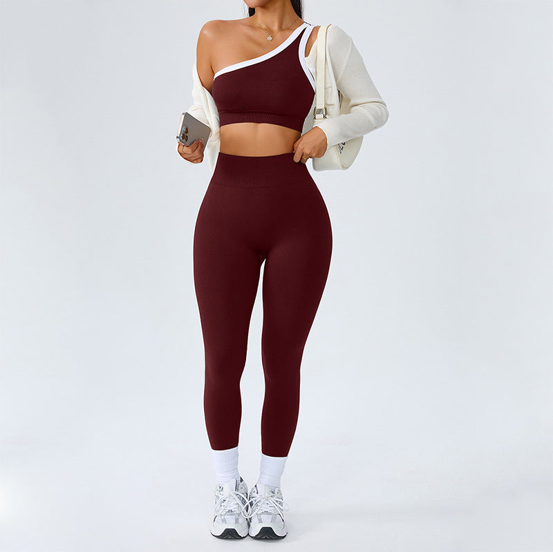 Side view of the one shoulder yoga set, cropped bra above high waist full length leggings