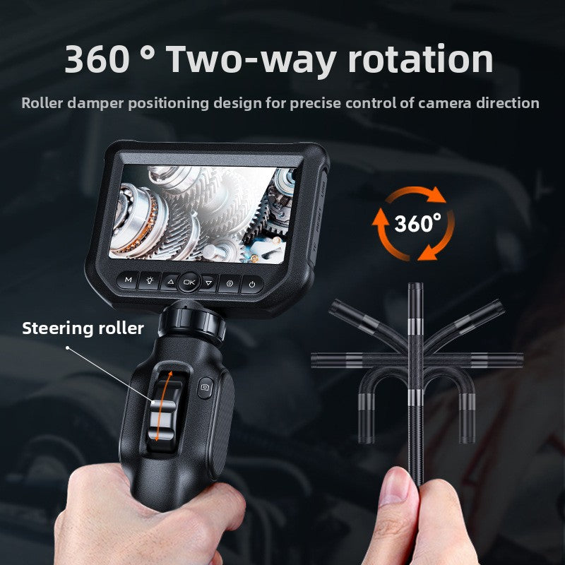 Hand turning the steering roller on a borescope handle with a 360 degree two-way rotation callout