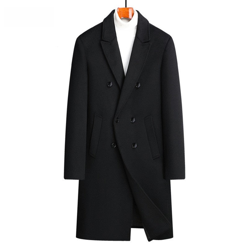 Black double breasted wool blend coat on a wooden hanger over a white roll neck, front view