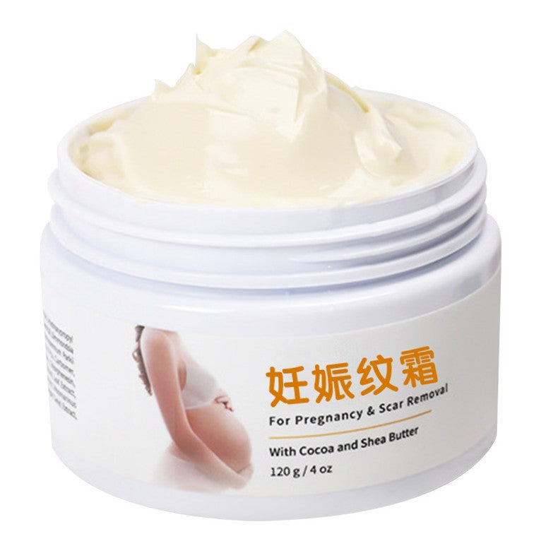 Stretch mark cream applied to abdomen during pregnancy skincare