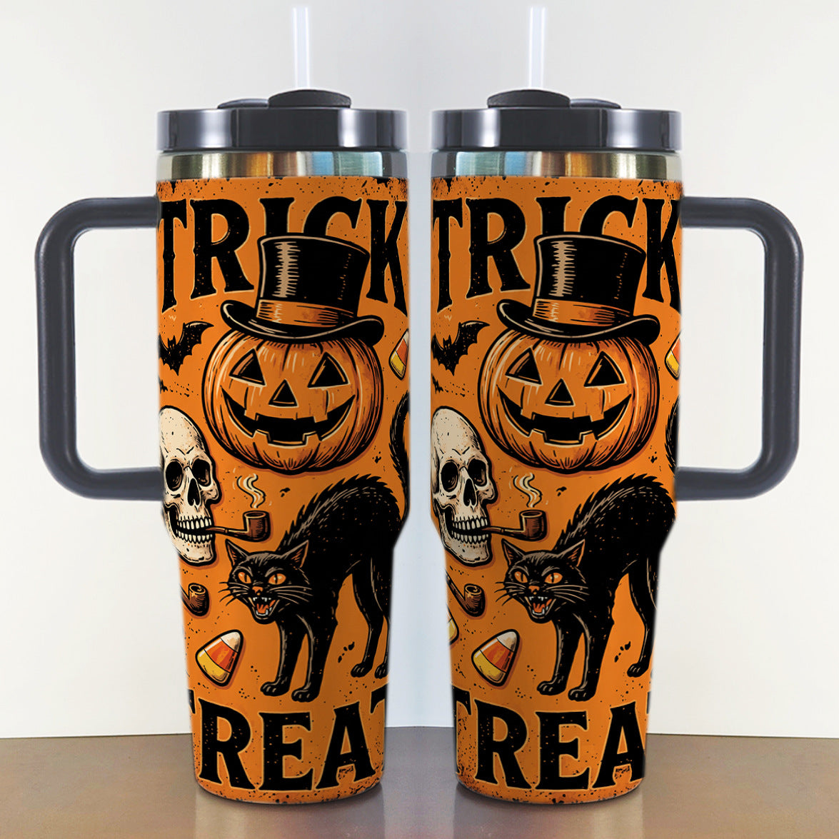40oz insulated tumbler printed with an orange Trick or Treat Halloween design