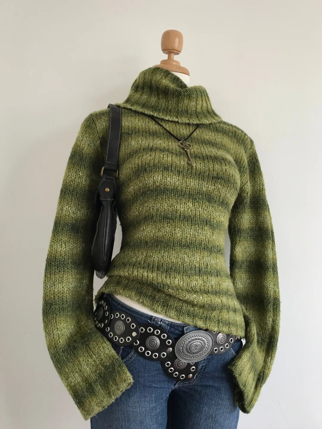 Moss green striped high collar knit sweater, option photo for size L, shown on a mannequin