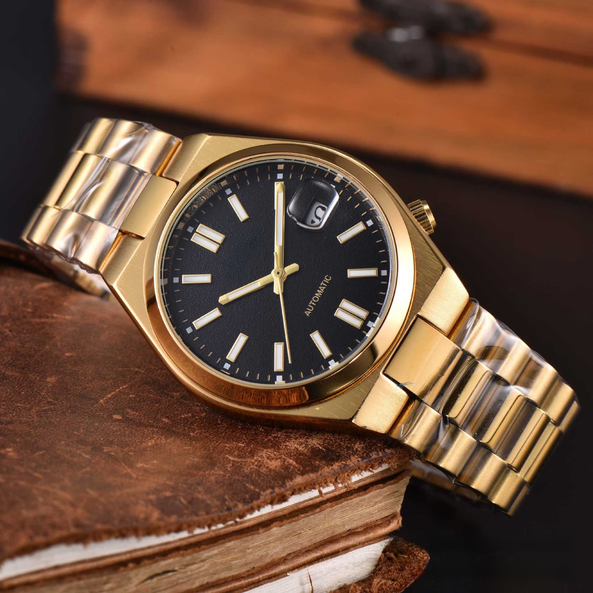 Watch held in hand showing the dial size and scale reference