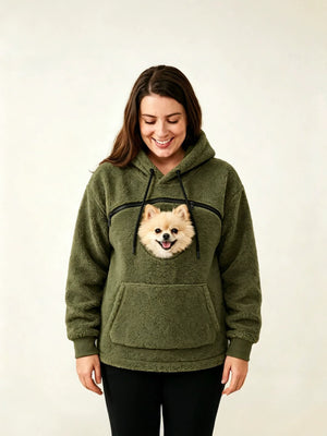 Army green teddy fleece hoodie with a chest opening where a small dog's head looks out above a front pocket