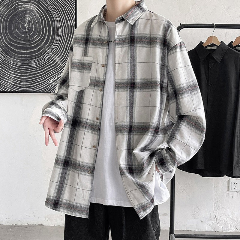 White and grey plaid oversized shirt worn open over a white tee