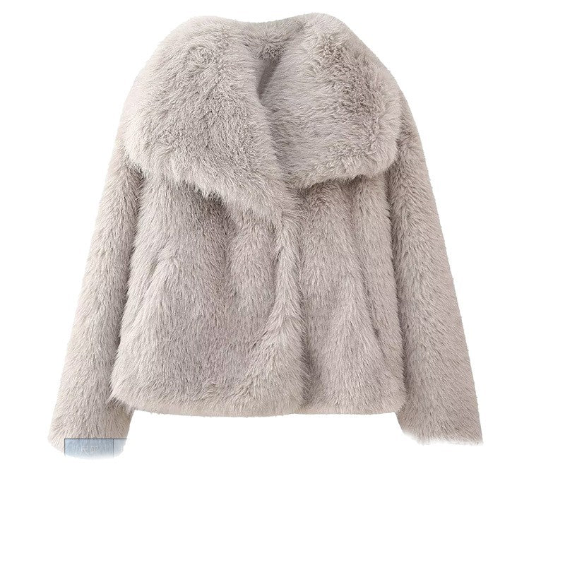 Soft faux fur cropped jacket with hidden side seam pockets and dense horizontal fur bands