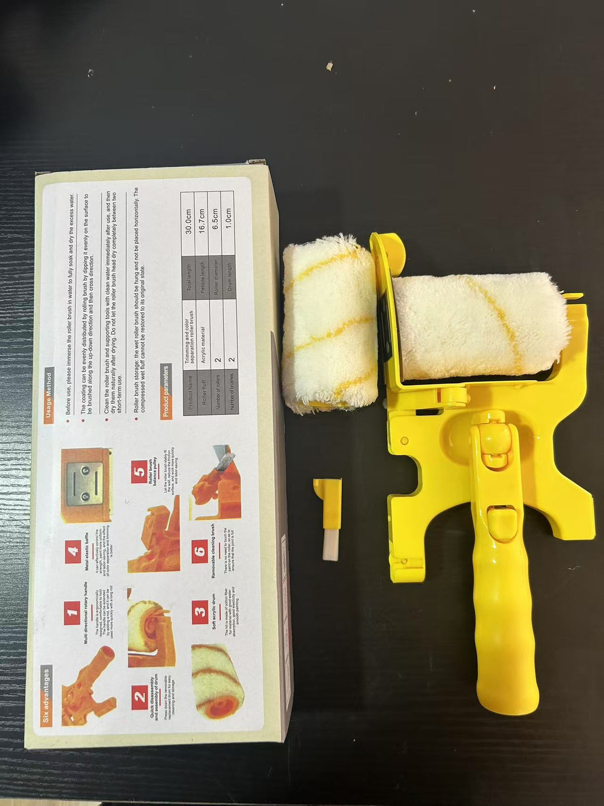 Yellow handle set beside its color box with an instruction panel, a second roller and a small brush, Color Box option