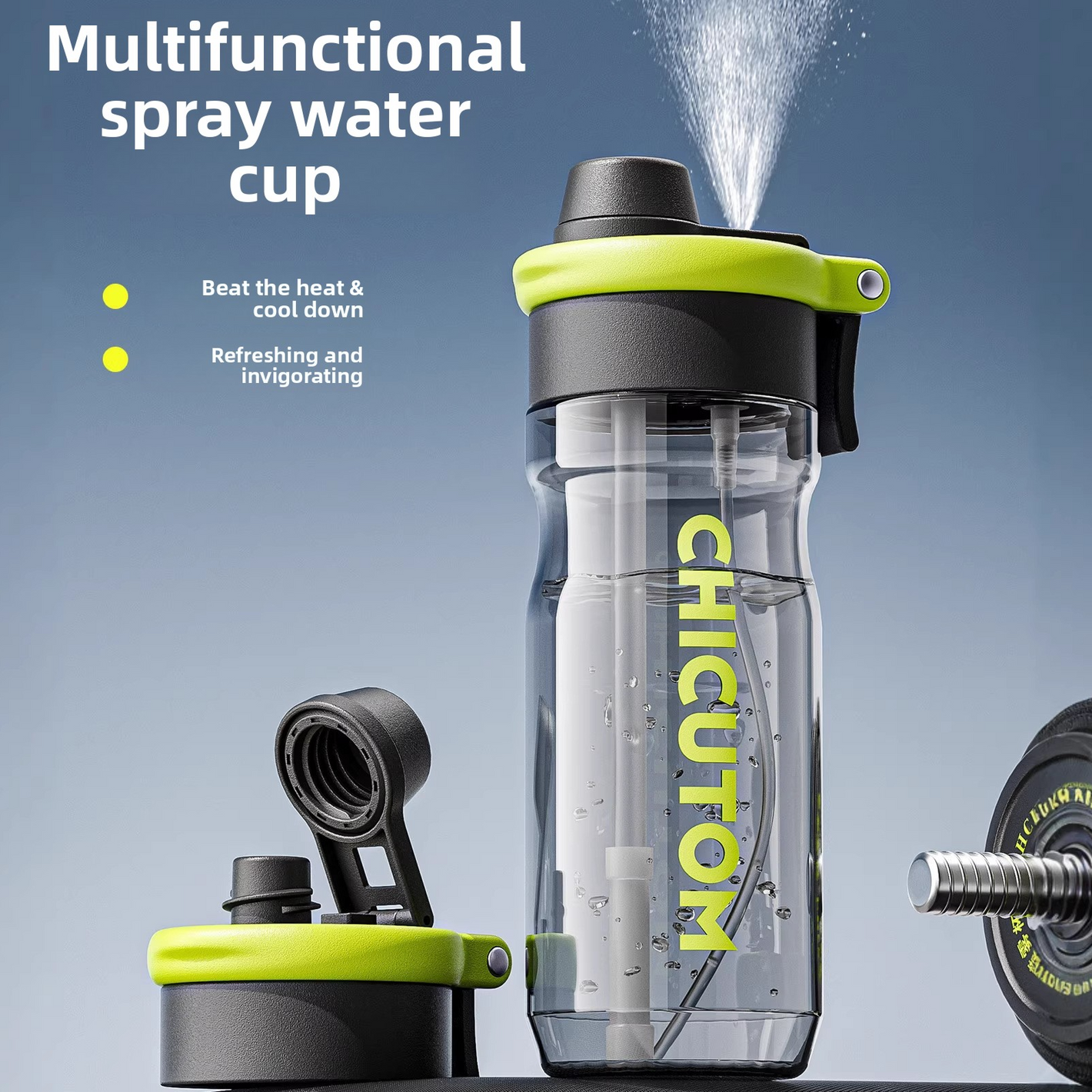 Tinted green plastic sports water bottle releasing a fine mist from its lid beside a barbell plate