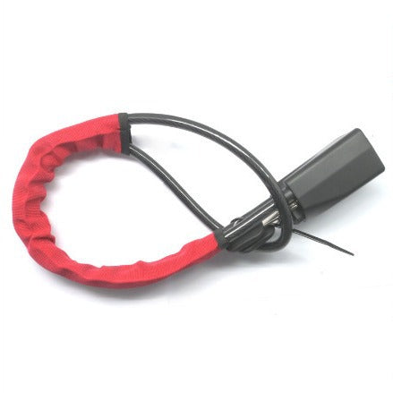 Steering wheel lock cable and blade key cylinder shown in close view