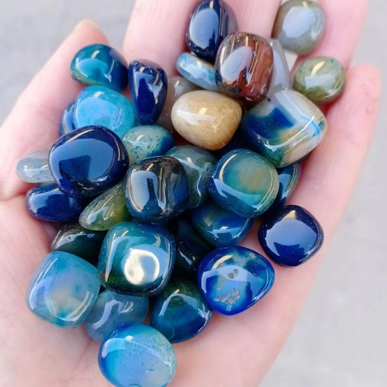 Orange polished agate pebbles glossy and smooth for home decoration
