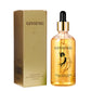 Ginseng gold facial essence dropper bottle beside its gold ginseng carton on white