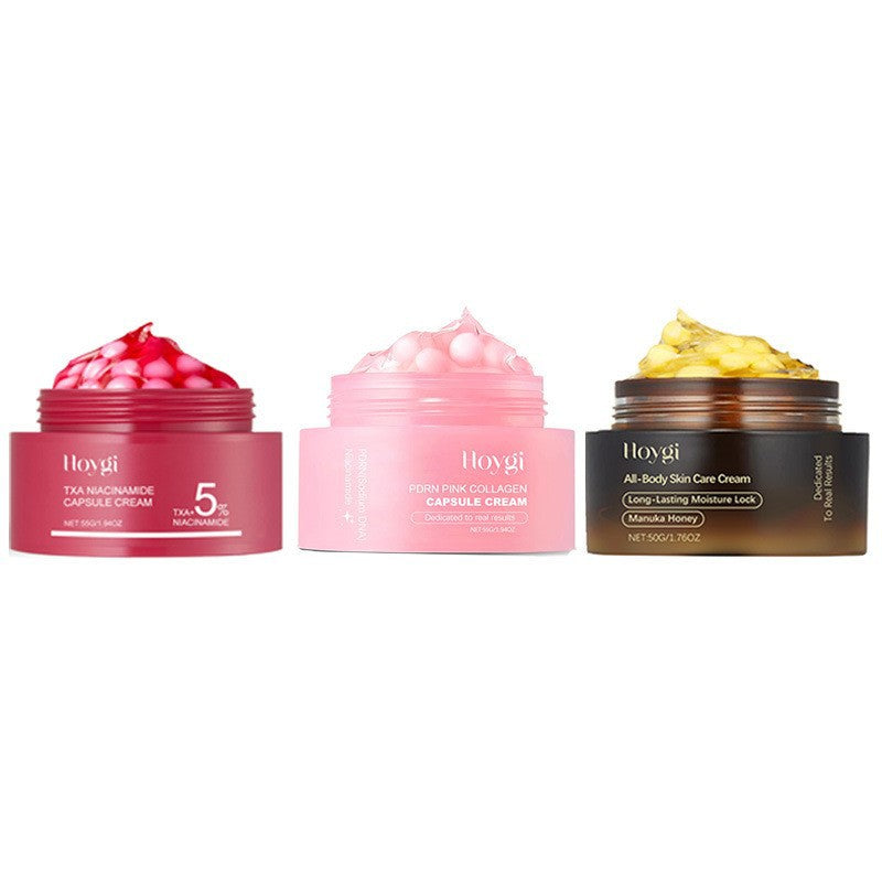 Three Hoygi capsule cream jars in red, pink and amber side by side, the formulas in this listing