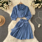 The short-sleeve shirt and skirt set worn during a casual daytime moment