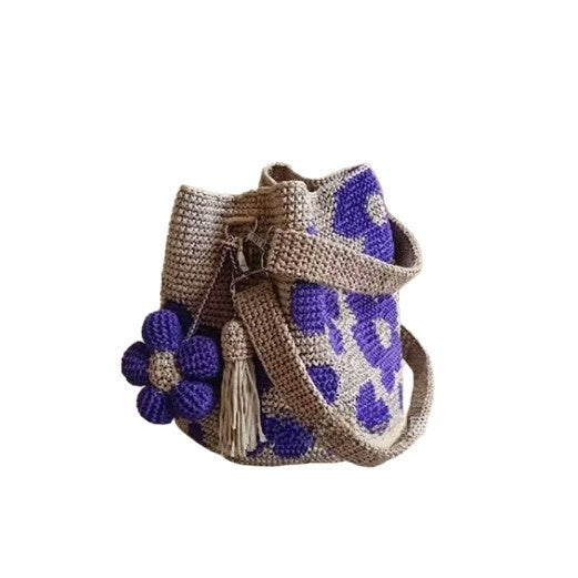 Purple floral crochet cotton bucket bag with a detachable crochet flower and tassel charm