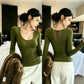 Olive green long sleeve top shown front and back, V shaped sheer floral lace panel on the upper back