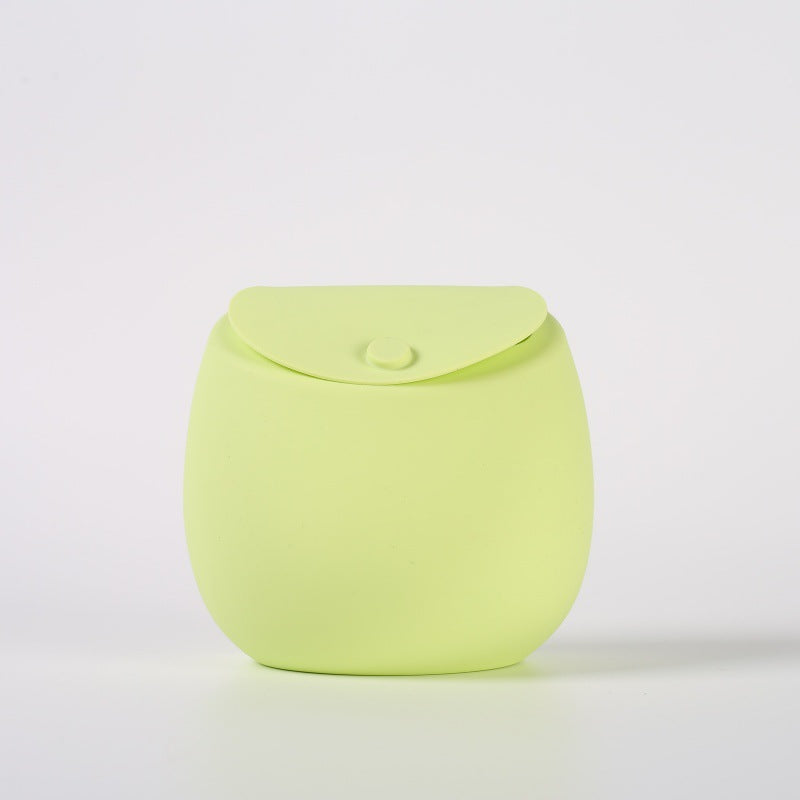 Silicone dog treat pouch shown from the front with its rounded magnetic flap
