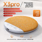 Brown fabric pillow speaker on a crumpled white sheet in daylight