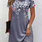Relaxed floral print short sleeve dress showing the straight easy body and print