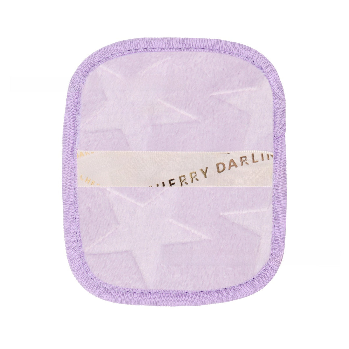 Reusable makeup remover pad in a leopard print with a satin hand strap on a plain ground