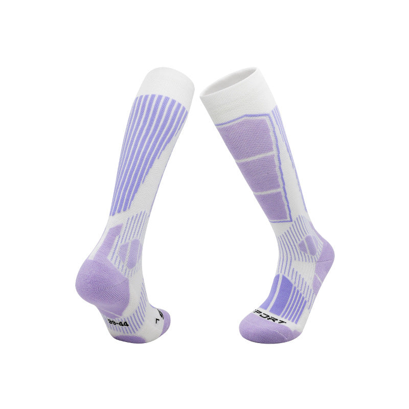 Warm knee high ski socks in a merino wool blend with a cushioned sole, colourway pair