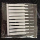 Ten mini cleaning brushes with nylon and wire ends sealed in a clear plastic pack