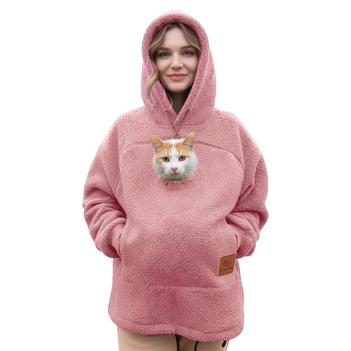 Dusty pink lamb fleece hoodie with a cat looking out of the chest pouch, studio front view, size S option