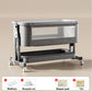 Gray baby crib with a gray metal frame and wheels, Standard model with mattress and mosquito net shown, dark gray option
