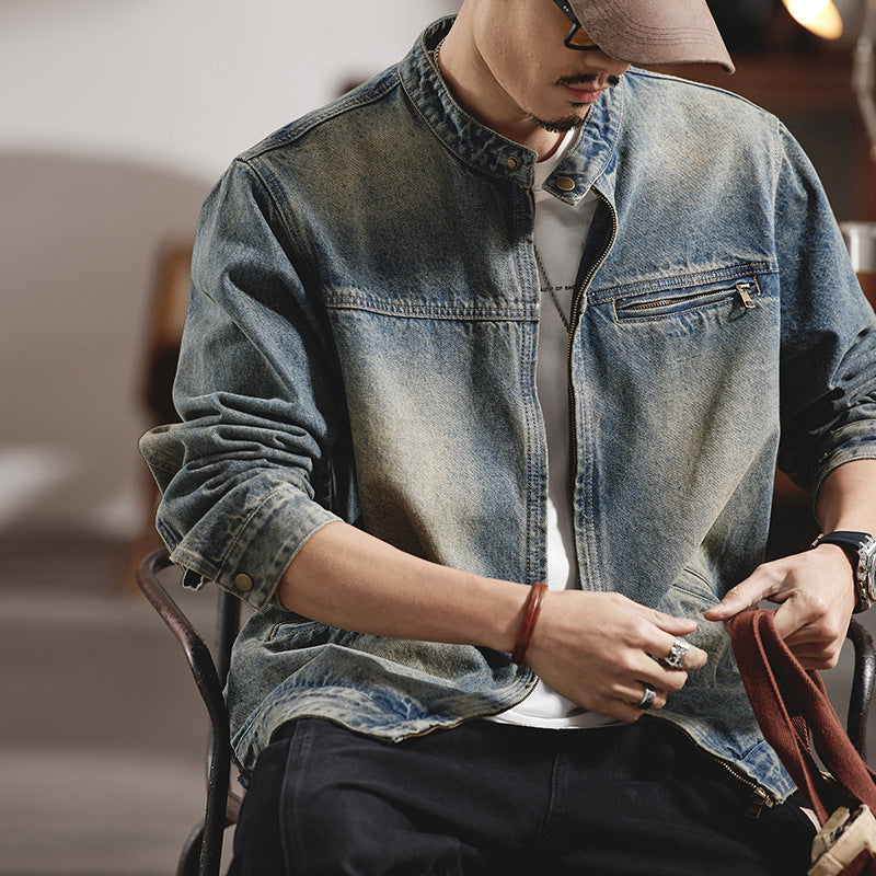 Styled shot of the mens denim jacket in Black with rolled cuffs