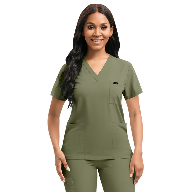 V neck short sleeve scrub top with a chest pocket and two lower patch pockets